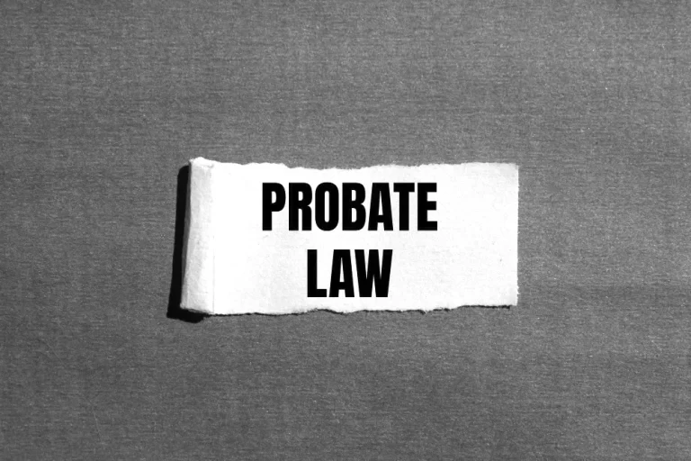 A piece of paper with the words "Probate Law" highlights the legal process of probate.