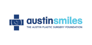 Logo for "Austin Smiles" featuring a blue cross symbol to the left and the text "austin smiles The Austin Plastic Surgery Foundation" in blue shades.