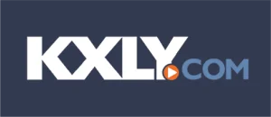 KXLY.COM logo features bold white letters and a small orange play button on a dark blue background.