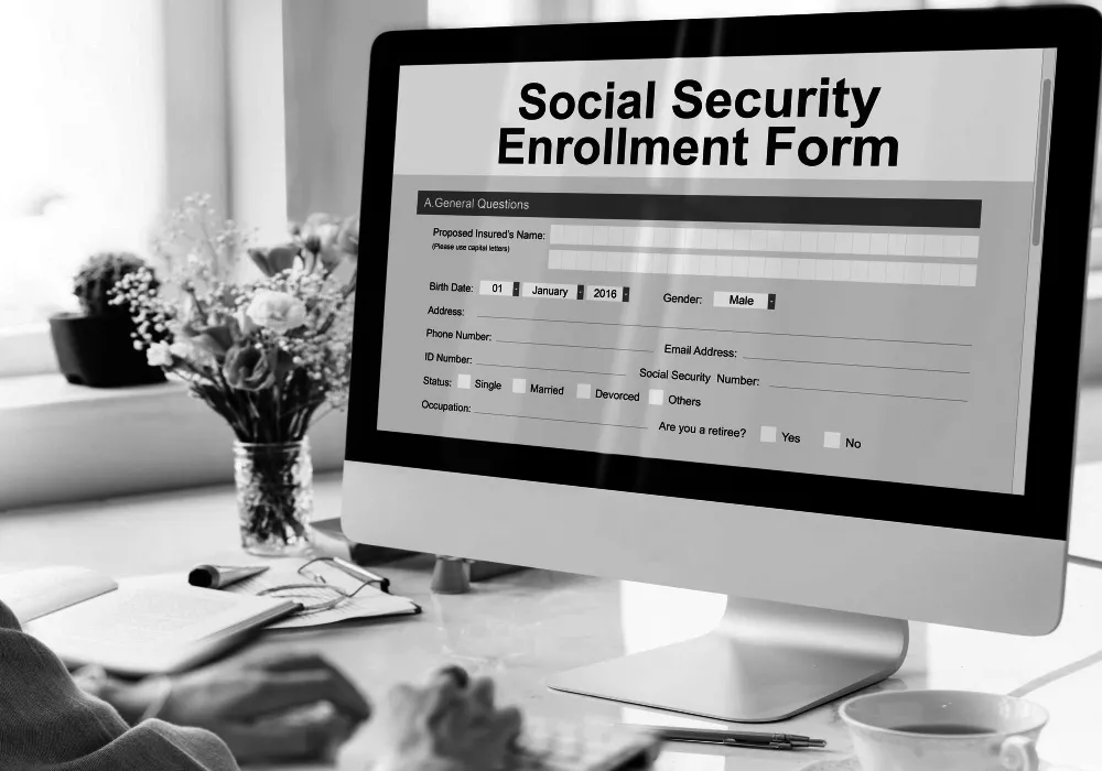 A computer screen displays a Social Security Enrollment Form, emphasizing the importance of determining the best age to take social security.
